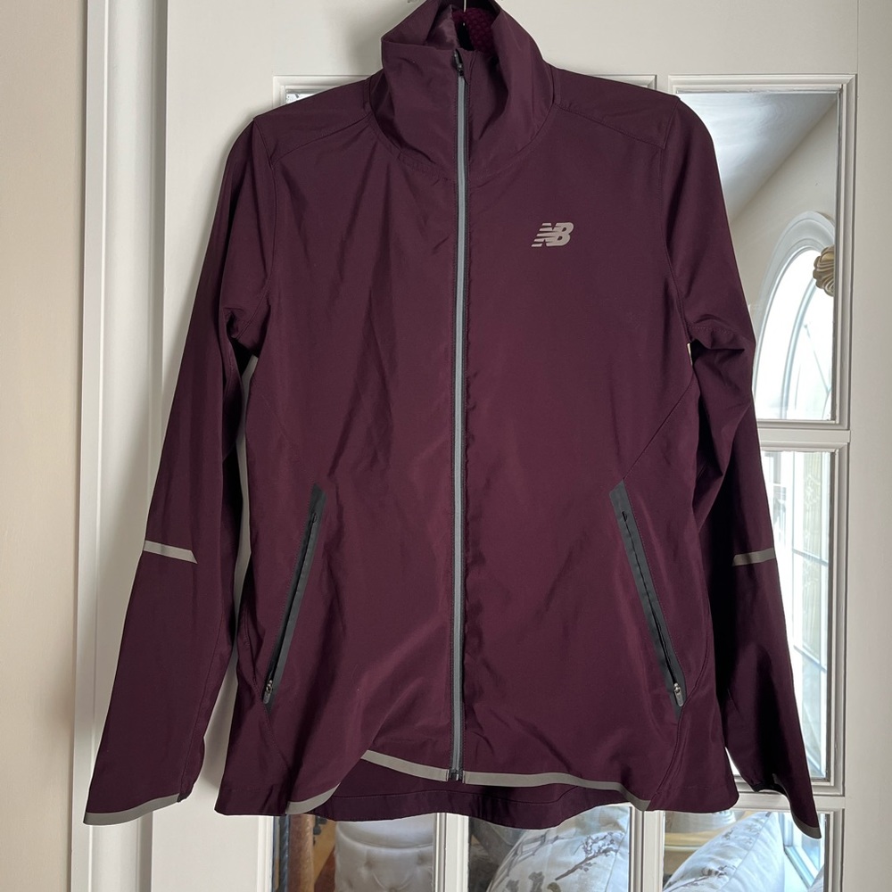 NEW BALANCE light weight jacket with removable interior. Size M